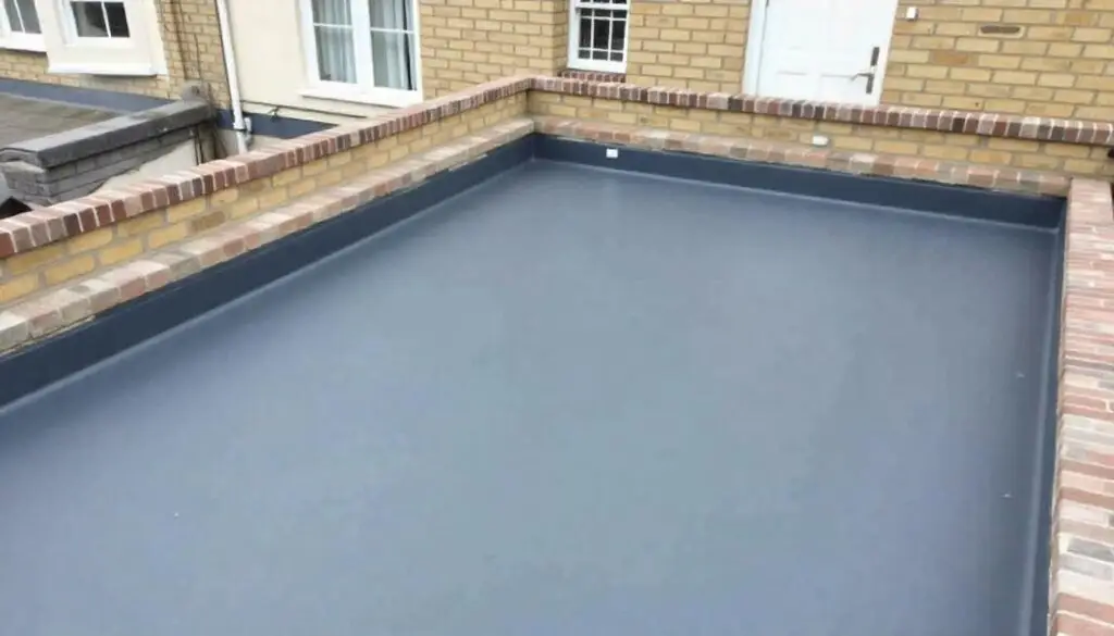 Flat roof featuring a grey roofing membrane, showcasing Cold Applied Liquid Roofing in London.