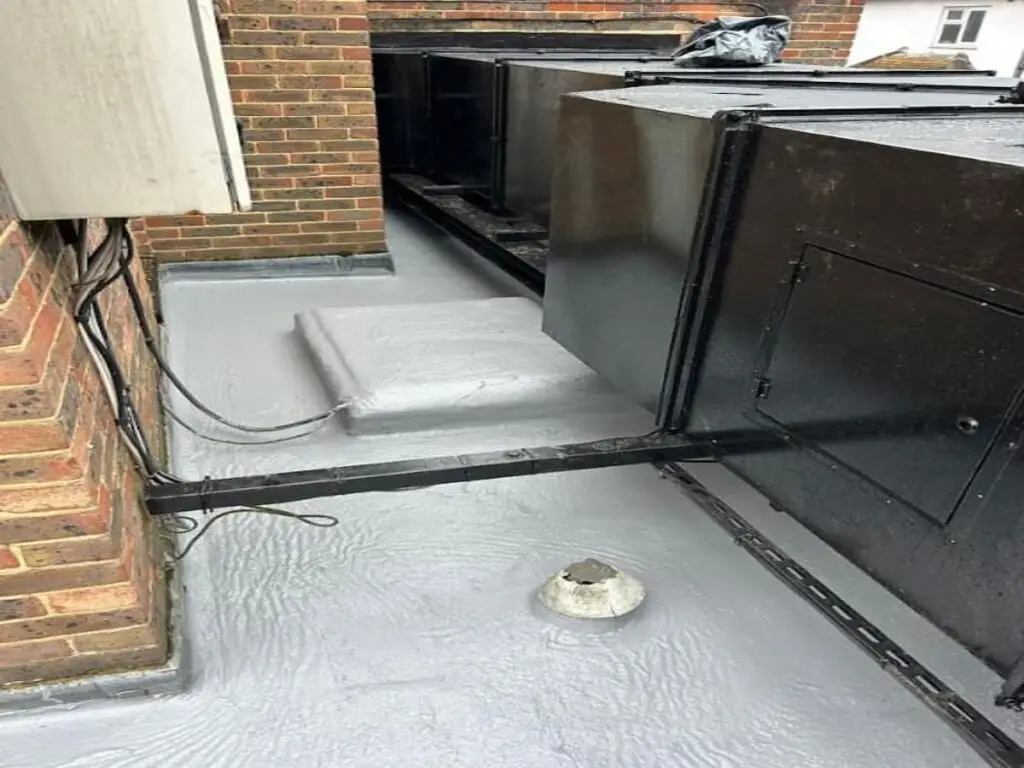 Flat roof waterproofing around HVAC units for a durable and leak-free finish.